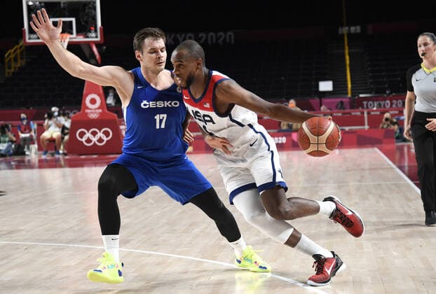 United States Khris Middleton (R) drives to the basket guarded by Czechoslovakia s Jaromir Bohacik (17) during a Men s Basketball game at the Tokyo 2020 Olympics, Saturday, July 31, 2021, in Tokyo, Japan. USA won, 119-84.  OLY20210731826 MIKExTHEILER