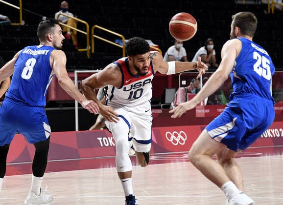 United States Jayson Tatum (C) loses control of the ball on a drive to the basket as he is defended by Czechoslovakia s Tomas Satoransky (8) and David Jelinek during a Men s Basketball game at the Tokyo 2020 Olympics, Saturday, July 31, 2021, in Tokyo, Japan. USA won, 119-84.  OLY20210731827 MIKExTHEILER