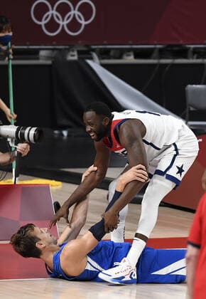 United States Draymond Green helps up Czechoslovakia s Jan Vesely after fouling him during a Men s Basketball game at the Tokyo 2020 Olympics, Saturday, July 31, 2021, in Tokyo, Japan. USA won, 119-84.  OLY20210731833 MIKExTHEILER