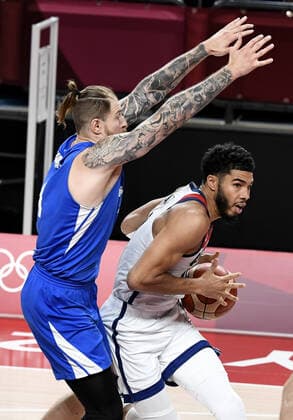 United States Jayson Tatum (R) drives under the outstretched arms of Czechoslovakia s Patrik Auda during a Men s Basketball game at the Tokyo 2020 Olympics, Saturday, July 31, 2021, in Tokyo, Japan. USA won, 119-84.  OLY20210731836 MIKExTHEILER