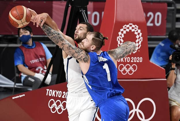 United States Zach Lavine and Czechoslovakia s Patrik Auda fight for control of a rebound during a Men s Basketball game at the Tokyo 2020 Olympics, Saturday, July 31, 2021, in Tokyo, Japan. USA won, 119-84.  OLY20210731837 MIKExTHEILER