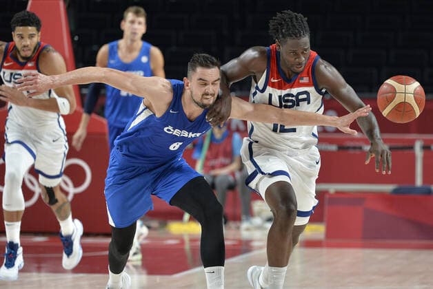 United States Jrue Holiday (R) battles Czechoslovakia s Tomas Satoransky for the loose ball during a Men s Basketball game at the Tokyo 2020 Olympics, Saturday, July 31, 2021, in Tokyo, Japan. USA won, 119-84.  OLY20210731841 MIKExTHEILER