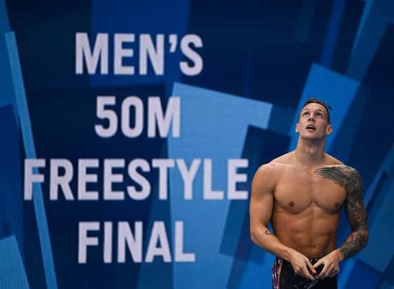 (210801) -- TOKYO, Aug. 1, 2021 -- Caeleb Dressel of the United States reacts after the men s 50m freestyle final of swimming at the Tokyo 2020 Olympic Games, Olympische Spiele, Olympia, OS in Tokyo, Japan, Aug. 1, 2021. ) (TOKYO2020)XHTP-JAPAN-TOKYO-OLY-SWIMMING-MEN S 50M FREESTYLE-FINAL WangxJingqiang 