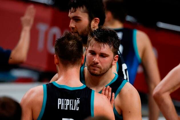 Slovenia s Luka Doncic (R) and Klemen Prepelic (L) celebrate their victory following the match for Group C of men s basketball between Spain and Slovenia for the 2020 Olympic Games, Olympische Spiele, Olympia, OS at the Saitama Super Arena in Tokyo, Japan, 01 August 2021. 2020 Olympics Basketball: Spain - Slovenia !ACHTUNG: NUR REDAKTIONELLE NUTZUNG!  Copyright: xFernandoxBizerrax EVE5912 20210801-14b964bd0dbb26a3e244ade4f618a14cffe4ced2