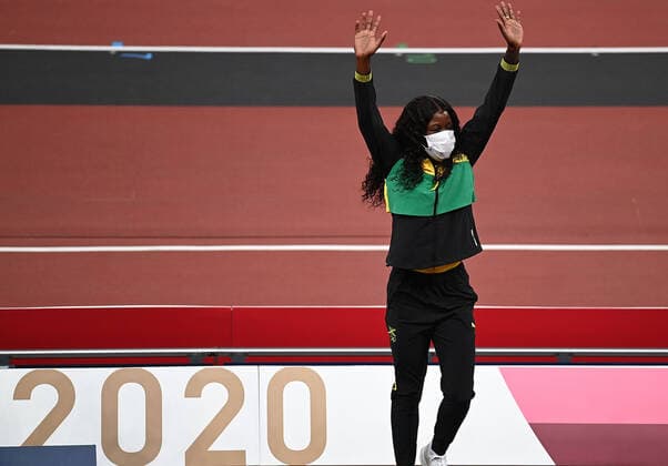 (210801) -- TOKYO, Aug. 1, 2021 -- Shericka Jackson of Jamaica reacts during the awarding ceremony of the Women s 100m at the Tokyo 2020 Olympic Games, Olympische Spiele, Olympia, OS in Tokyo, Japan, Aug. 1, 2021. ) (TOKYO2020)JAPAN-TOKYO-OLY-ATHLETICS-WOMEN S 100M-AWARDING CEREMONY LixYibo 