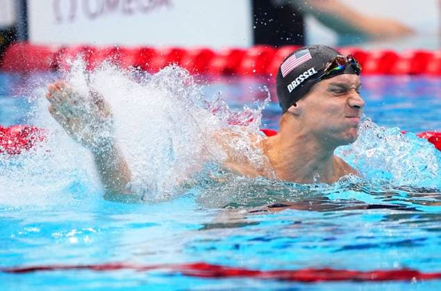 (210801) -- TOKYO, Aug. 1, 2021 -- Caeleb Dressel of the United States celebrates after the men s 50m freestyle final of swimming at the Tokyo 2020 Olympic Games, Olympische Spiele, Olympia, OS in Tokyo, Japan, Aug. 1, 2021. ) (TOKYO2020)XHTP-JAPAN-TOKYO-OLY-SWIMMING-MEN S 50M FREESTYLE-FINAL XuxChang 