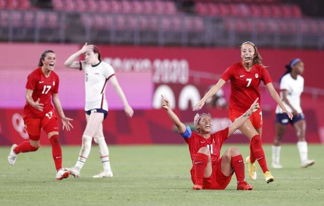 Tokyo Olympics: Football Canadian players (red) celebrate after upsetting the United States in their Tokyo Olympic women s football semifinal on Aug. 2, 2021, at Kashima Stadium in Ibaraki Prefecture, eastern Japan.  A14AA0000756003P
