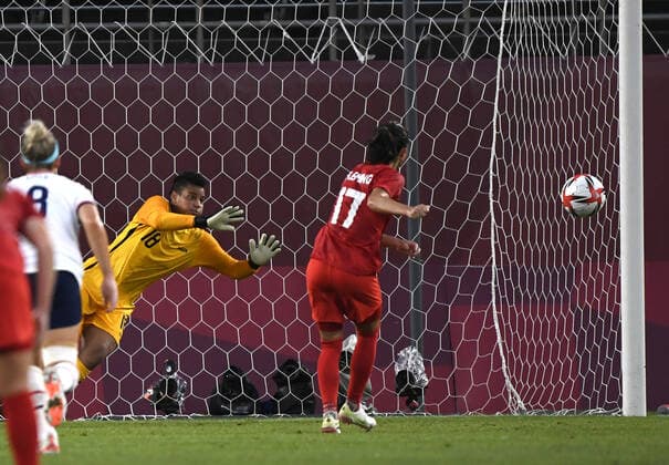 Canada s Jessie Fleming (17) scores a penalty kick against the United States goalkeeper Adrianna Franch during the Women s Soccer semi-final match at the Tokyo 2020 Olympics, Monday, August 2, 2021, in Kashima, Japan. Canada defeated the USA 1-0 on that penalty kick.  OLY20210802803 MIKExTHEILER