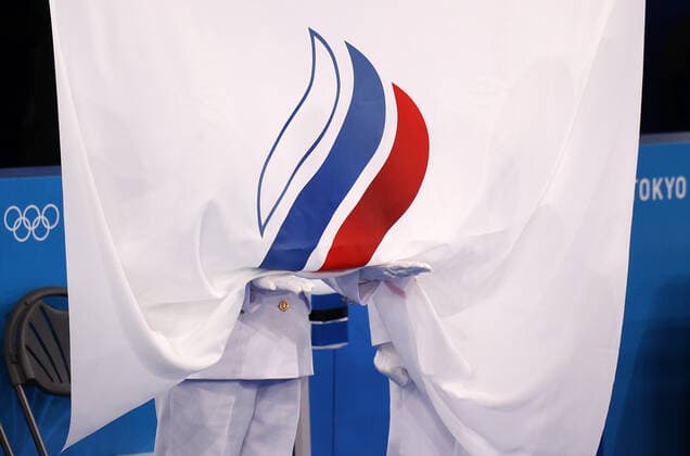 TOKYO, JAPAN - AUGUST 2, 2021: The flag of the Russian Olympic Committee is hoisted at an award ceremony for the womenâ€™s artistic gymnastics floor exercise during the 2020 Summer Olympic Games, Olympische Spiele, Olympia, OS at the Ariake Gymnastics Centre. Sergei Bobylev TASS  TS10AF43