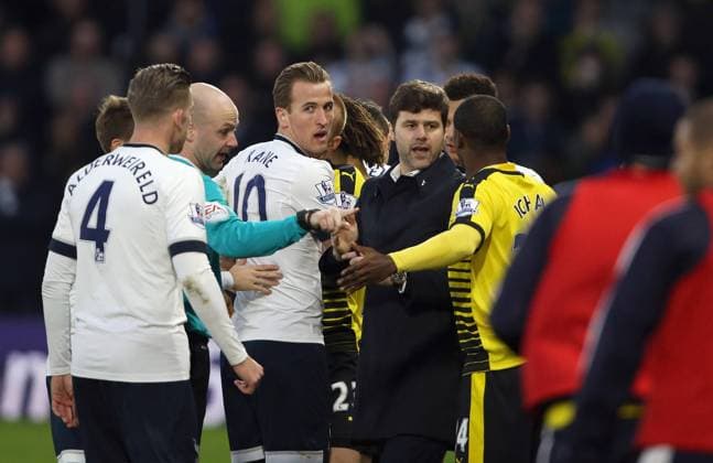 Mandatory Credit: Photo by Shutterstock (5502434p) Harry Kane of Spurs with Mauricio Pochettino, Manager of Tottenham and Idion Ighalo of Watford involved on the half way line. Watford FC vs Tottenham Hotspur, Barclays Premier League, Football, Vicarage Road, Watford, Britain - 28 Dec 2015 Editorial use only. No merchandising. For Football images FA and Premier League restrictions apply inc. no internet mobile usage without FAPL license - for details contact Football Dataco Watford FC vs Tottenham Hotspur, Barclays Premier League, Football, Vicarage Road, Watford, Britain - 28 Dec 2015 Editorial use only. No merchandising. For Football images FA and Premier League restrictions apply inc. no internet mobile usage without FAPL license - for details contact Football Dataco  Copyright: xShutterstockx 5502434p