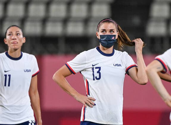 (210802) -- IBARAKI, Aug. 2, 2021 -- Alex Morgan(R) of the United States reacts after the women s football semi final match between the United States and Canada at the Tokyo 2020 Olympic Games, Olympische Spiele, Olympia, OS in Ibaraki, Japan, Aug. 2, 2021. ) (TOKYO2020)JAPAN-IBARAKI-WOMEN S FOOTBALL-SEMI FINAL-USA VS CAN LuxYang 