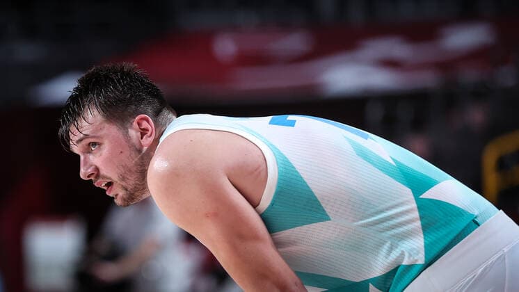 (210803) -- SAITAMA, Aug. 3, 2021 -- Luka Doncic of Slovenia reacts during the men s basketball quarterfinal match between Slovenia and Germany at Tokyo 2020 Olympic Games, Olympische Spiele, Olympia, OS in Saitama, Japan, Aug. 3, 2021. ) (TOKYO2020)JAPAN-SAITAMA-OLY-BASKETBALL-MEN S QUARTERFINAL-SLO VS GER PanxYulong 