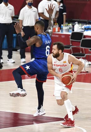 Spain s Ricky Rubio (R) has the United States Damian Lillard turned around as he drives to the basket during Men s Basketball quarterfinal game at the Tokyo 2020 Olympics, Tuesday, August 3, 2021, in Tokyo, Japan. USA won 95-81 to advance to the semi-final round.  OLY20210803815 MIKExTHEILER