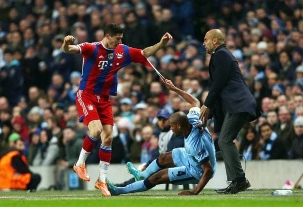 Mandatory Credit: Photo by Matt West BPI Shutterstock (4271309w) Robert Lewandowski of Bayern Munich and Vincent Kompany of Manchester City crash into manager Josep Guardiola UEFA Champions League 2014 15 Group Stage Group E Manchester City v Bayern Munich Etihad Stadium, Ashton New Rd, Manchester, United Kingdom - 25 Nov 2014 EDITORIAL USE ONLY UEFA Champions League 2014 15 Group Stage Group E Manchester City v Bayern Munich Etihad Stadium, Ashton New Rd, Manchester, United Kingdom - 25 Nov 2014 EDITORIAL USE ONLY  Copyright: xMattxWest BPI Shutterstockx 4271309w