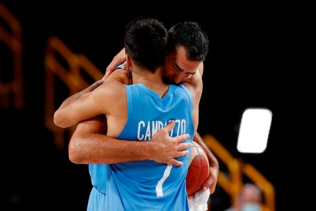 Argentinian pivot Luis Scola (R) embraces his team mate Facundo Campazzo (L) after the defeat of the team and their last game after the Basketball quartefinal game between Argentina and Australia during the Tokyo 2020 Olympics Games played at Super Arena stadium of Saitama, Japan on 03 August 2021. Australia vs Argentina !ACHTUNG: NUR REDAKTIONELLE NUTZUNG!  Copyright: xEnricxFontcubertax EVE7335 20210803-8346608e6b1c250a95320ac44ad70a06f70b8286