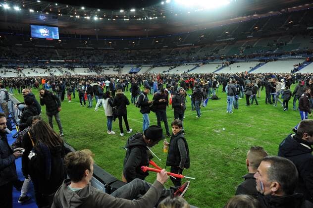 Mandatory Credit: Photo by BPI Shutterstock (5367730y) Fans race back into the Stadium after hearing of bombings outside during the International Friendly, Länderspiel, Nationalmannschaft match between France and Germany, at the Stade de France, Paris on the 13th of November 2015. Football - International Friendlies 2015 France v Germany Stade de France, Saint-Denis, France - 13 Nov 2015 Editorial use only. No merchandising. For Football images FA and Premier League restrictions apply inc. no internet mobile usage without FAPL license - for details contact Football Dataco Football - International Friendlies 2015 France v Germany Stade de France, Saint-Denis, France - 13 Nov 2015 Editorial use only. No merchandising. For Football images FA and Premier League restrictions apply inc. no internet mobile usage without FAPL license - for details contact Football Dataco  Copyright: xBPI Shutterstockx 5367730y