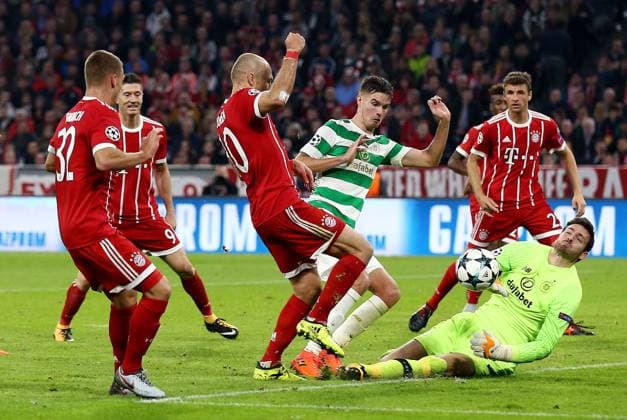 Mandatory Credit: Photo by James Marsh BPI Shutterstock (9146729ch) Craig Gordon of Celtic makes a save from Arjen Robben of Bayern Munich. Bayern Munich v Celtic, UEFA Champions League, Group B, Allianz Arena, Munich, Germany, 18 October 2017 EDITORIAL USE ONLY No use with unauthorised audio, video, data, fixture lists, club league logos or live services. Online in-match use limited to 75 images, no video emulation. No use in betting, games or single club league player publications. Bayern Munich v Celtic, UEFA Champions League, Group B, Allianz Arena, Munich, Germany, 18 October 2017 EDITORIAL USE ONLY No use with unauthorised audio, video, data, fixture lists, club league logos or live services. Online in-match use limited to 75 images, no video emulation. No use in betting, games or single club league player publications.  Copyright: xJamesxMarsh BPI Shutterstockx 9146729ch