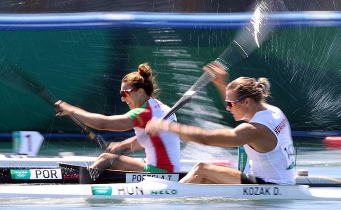 TOKYO, JAPAN â€“ AUGUST 5, 2021: Teresa Portela (L) of Portugal and Danuta Kozak of Hungary compete in a women s 500m kayak single semi-final during the Tokyo 2020 Summer Olympic Games, Olympische Spiele, Olympia, OS at the Sea Forest Waterway. Sergei Bobylev TASS  TS10B5BD