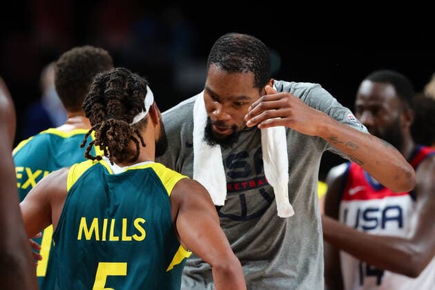 TOKYO, JAPAN - AUGUST 05: Kevin Durant of Team United States hugs Patty Mills of Team Australia after the Men s Basketball Semifinal match between USA and Australia on Day 13 of the Tokyo 2020 Olympic Games, Olympische Spiele, Olympia, OS at Saitama Super Arena on August 05, 2021 in Tokyo, Japan. (Photo by Pete Dovgan Speed Media Icon Sportswire) OLYMPICS: AUG 05 Olympics Tokyo 2020 Icon2108050182