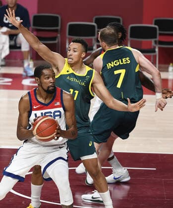 United States Kevin Durant (L) is defended by Australia s Dante Exum (11) during Men s Basketball semifinal at the Tokyo 2020 Olympics, Thursday, August 5, 2021, in Tokyo, Japan. USA advanced to the Gold Medal game with a 97-78 win.  OLY20210805812 MIKExTHEILER