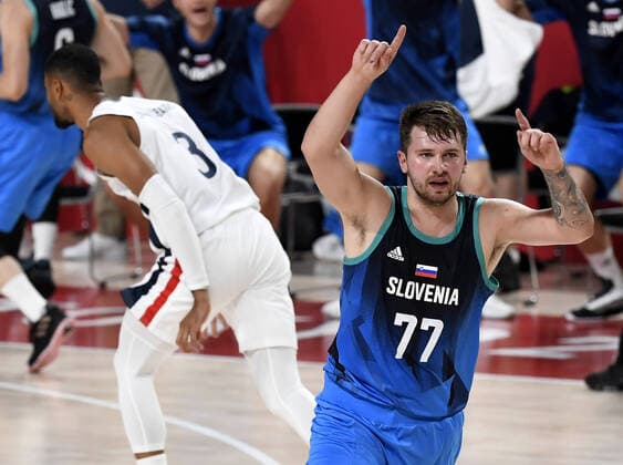 Slovenia s Luka Doncic (77) gestures to the referee after being fouled by France s Timothe Luwawu Cabarrot (3) during Men s Basketball semifinal at the Tokyo 2020 Olympics, Thursday, August 5, 2021, in Tokyo, Japan. France edged Slovenia 90-89 and will play the USA in the Gold Medal game.  OLY20210805825 MIKExTHEILER