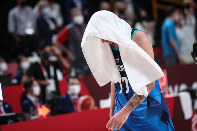 (210805) -- SAITAMA, Aug. 5, 2021 -- Luka Doncic of Slovenia leaves the court after the men s basketball semifinal between France and Slovenia at Tokyo 2020 Olympic Games, Olympische Spiele, Olympia, OS in Saitama, Japan, Aug. 5, 2021. ) (TOKYO2020)JAPAN-SAITAMA-OLY-BASKETBALL-MEN S SEMIFINAL-FRA VS SLO PanxYulong 