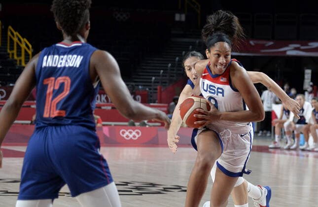United States A ja Wilson (9) moves into the lane as Serbia s Jelena Brooks tries to steal the ball from behind and teammate Yvonne Anderson (12) defends during the Women s Basketball semifinal at the Tokyo 2020 Olympics, Friday, August 6, 2021, in Tokyo, Japan. USA won, 70-59 to advance to the Gold Medal game.  OLY20210806807 MIKExTHEILER