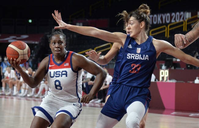 United States Chelsea Gray (8) looks to score Serbia s Tina Krajisnik (R) during the Women s Basketball semifinal at the Tokyo 2020 Olympics, Friday, August 6, 2021, in Tokyo, Japan. USA won, 70-59 to advance to the Gold Medal game.  OLY20210806809 MIKExTHEILER