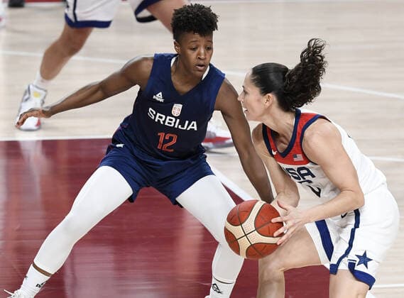 United States Sue Bird (R) moves into the lane as Serbia s Yvonne Anderson defends during the Women s Basketball semifinal at the Tokyo 2020 Olympics, Friday, August 6, 2021, in Tokyo, Japan. USA won, 70-59 to advance to the Gold Medal game.  OLY20210806815 MIKExTHEILER