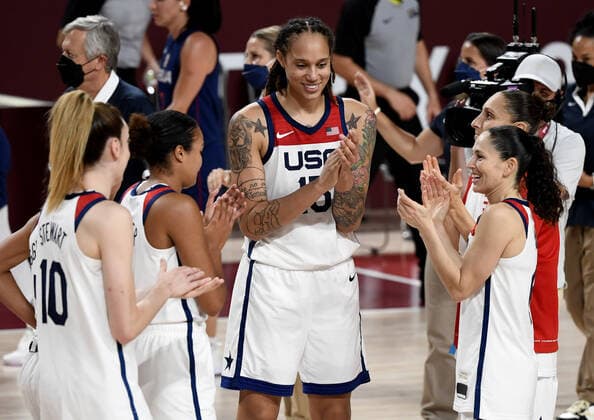 United States team members, including Brittney Griner (C) and Sue Bird (R), celebrate their victory over Serbia in the Women s Basketball semifinal at the Tokyo 2020 Olympics, Friday, August 6, 2021, in Tokyo, Japan. USA won, 70-59 to advance to the Gold Medal game.  OLY20210806801 MIKExTHEILER