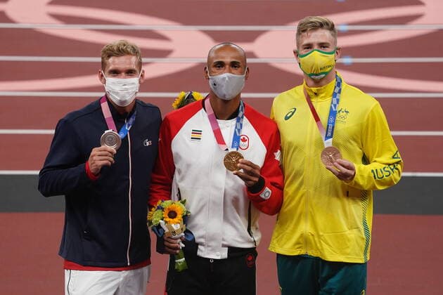 August 6, 2021, Tokyo, Japan: Gold medallist Damian Warner of Canada (centre), silver medallist Kevin Mayer of France (left) and bronze medallist Ashley Moloney of Australia pose on the podium during the medal ceremony for men s decathlon at the Tokyo Olympics in Tokyo, Japan on Friday, Aug.6, 2021. Canada News - August 6, 2021  - ZUMAc35_ 20210806_zaf_c35_006 Copyright: xNathanxDenettex