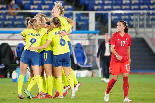 August 6, 2021, Tokyo, Japan: Sweden celebrates their goal as Canada s Jessie Fleming looks on in the women s soccer final during the summer Tokyo Olympics in Tokyo, Japan on Friday, August 6, 2021. Canada News - August 6, 2021  - ZUMAc35_ 20210806_zaf_c35_029 Copyright: xFrankxGunnx