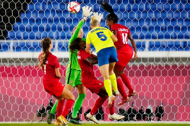 August 6, 2021, Tokyo, Japan: Canada goaltender Stephanie Labbe makes a save against Sweden s Hanna Bennison (5) in the women s soccer final during the summer Tokyo Olympics in Tokyo, Japan on Friday, August 6, 2021. Canada News - August 6, 2021  - ZUMAc35_ 20210806_zaf_c35_076 Copyright: xFrankxGunnx