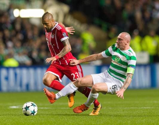 Mandatory Credit: Photo by Stuart Wallace Shutterstock (9184676q) Arturo Vidal of Bayern Munich tackled by Scott Brown of Celtic Celtic v Bayern Munich, UEFA Champions League, Group B, Celtic Park, Glasgow, UK - 31 October 2017 Celtic v Bayern Munich, UEFA Champions League, Group B, Celtic Park, Glasgow, UK - 31 October 2017  Copyright: xStuartxWallace Shutterstockx 9184676q