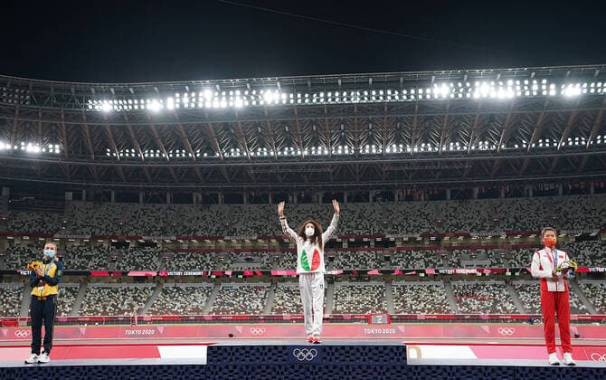 (210807) -- TOKYO, Aug. 7, 2021 -- Gold medalist Antonella Palmisano (C) of Italy, silver medalist Sandra Lorena Arenas (L) of Colombia and bronze medalist Liu Hong of China react during the awarding ceremony of the Women s 20km Race Walk at the Tokyo 2020 Olympic Games, Olympische Spiele, Olympia, OS in Tokyo, Japan, Aug. 7, 2021. ) (TOKYO2020)JAPAN-TOKYO-OLY-ATHLETICS-WOMEN S 20KM RACE WALK-AWARDING CEREMONY LuixSiuxWai 