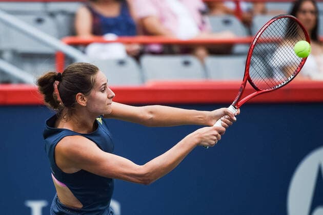 August 07, 2021: Raphaelle Lacasse (CAN) returns the ball during the WTA, Tennis Damen National Bank Open qualifying round match at IGA Stadium in Montreal, Quebec. CSM Montreal Canada - ZUMAc04_ 20210807_zaf_c04_018 Copyright: xDavidxKirouacx