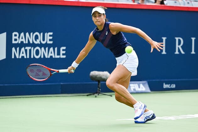 MONTREAL, QC - AUGUST 07: Caroline Garcia (FRA) runs towards the ball during the qualifying WTA, Tennis Damen National Bank Open match on August 7, 2021 at IGA Stadium in Montreal, QC (Photo by David Kirouac Icon Sportswire) TENNIS: AUG 07 National Bank Open Icon210807110