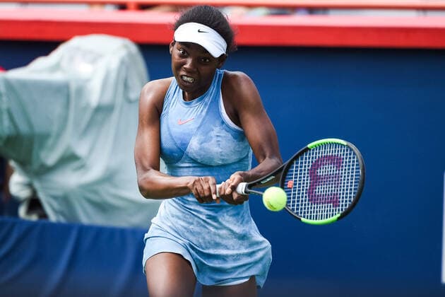 MONTREAL, QC - AUGUST 07: Francoise Abanda (CAN) returns the ball during the qualifying WTA, Tennis Damen National Bank Open match on August 7, 2021 at IGA Stadium in Montreal, QC (Photo by David Kirouac Icon Sportswire) TENNIS: AUG 07 National Bank Open Icon210807117