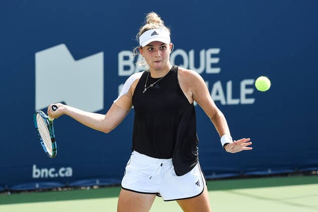 MONTREAL, QC - AUGUST 07: Clara Burel (FRA) returns the ball during the qualifying WTA, Tennis Damen National Bank Open match on August 7, 2021 at IGA Stadium in Montreal, QC (Photo by David Kirouac Icon Sportswire) TENNIS: AUG 07 National Bank Open Icon210807140