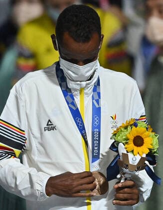 Belgian Bashir Abdi celebrates his bronze medal during the medal ceremony for the men s marathon during the closing ceremony of the Tokyo 2020 Olympic Games, Olympische Spiele, Olympia, OS in Tokyo, Japan on Sunday 08 August 2021. The postponed 2020 Summer Olympics are taking place from 23 July to 8 August 2021. DIRKxWAEM  x3059412x