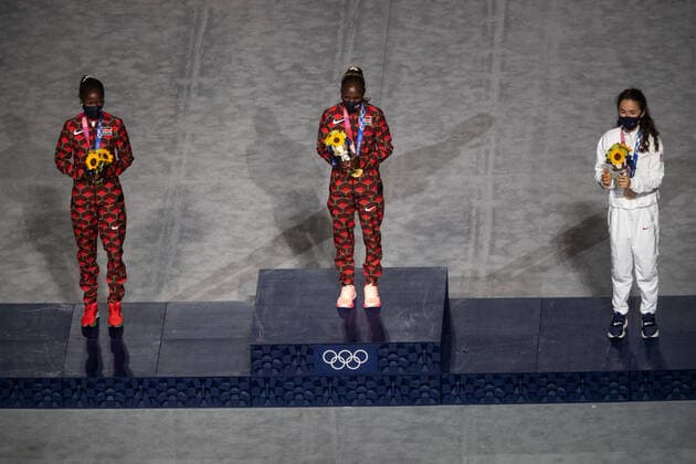 OLYMPICS - Summer Olympic Games, Olympische Spiele, Olympia, OS 2020 TOKYO,JAPAN,08.AUG.21 - OLYMPICS - Summer Olympic Games 2020, closing ceremony. Image shows the podium of the womens marathon with Brigid Kosgei (KEN), Peres Jepchirchir (KEN) and Molly Seidel (USA).  GEPAxpictures xMichaelxMeindl