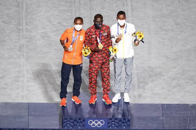 Mandatory Credit: Photo by Daniela Porcelli SPP Shutterstock (12253585v) Gold medalist Eliud Kipchoge (Kenya) middle), silver medalist Abdi Nageeye (Netherlands, left) and bronze medalist Bashir Abdi (Belgium) celebrates his medal during the Tokyo Olympics 2020 closing ceremony at the Olympic Stadium in Tokyo, Japan. Closing ceremony - Tokyo Olympics 2020 - Olympic Stadium Tokyo, Japan, August 8th 2021:, Toyko, Japan - 08 Aug 2021 Closing ceremony - Tokyo Olympics 2020 - Olympic Stadium Tokyo, Japan, August 8th 2021:, Toyko, Japan - 08 Aug 2021 Copyright: xDanielaxPorcelli SPP Shutterstockx 12253585v