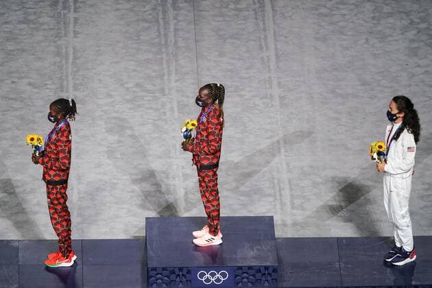 Mandatory Credit: Photo by Daniela Porcelli SPP Shutterstock (12253585n) Gold medalist Peres Jepchirchir (Kenya, middle), silver medalist Brigid Kosgei (Kenya, left) and bronze medalist Molly Seidel (USA) during their medal ceremony during the Tokyo Olympics 2020 closing ceremony at the Olympic Stadium in Tokyo, Japan. Closing ceremony - Tokyo Olympics 2020 - Olympic Stadium Tokyo, Japan, August 8th 2021:, Toyko, Japan - 08 Aug 2021 Closing ceremony - Tokyo Olympics 2020 - Olympic Stadium Tokyo, Japan, August 8th 2021:, Toyko, Japan - 08 Aug 2021 Copyright: xDanielaxPorcelli SPP Shutterstockx 12253585n