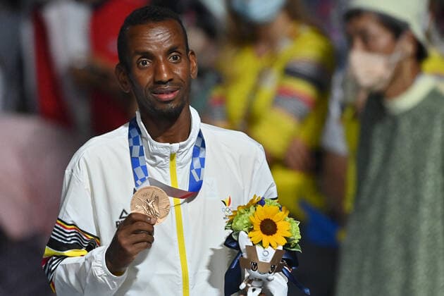 Belgian Bashir Abdi celebrates his bronze medal during the medal ceremony for the men s marathon during the closing ceremony of the Tokyo 2020 Olympic Games, Olympische Spiele, Olympia, OS in Tokyo, Japan on Sunday 08 August 2021. The postponed 2020 Summer Olympics are taking place from 23 July to 8 August 2021. DIRKxWAEM  x3059453x
