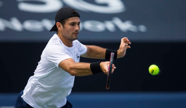 (210808) -- TORONTO, Aug. 8, 2021 -- Marcos Giron of the United States returns the ball against Brayden Schnur of Canada during the first round of men s qualifying singles match at the 2021 National Bank Open in Toronto, Canada, on Aug. 7, 2021. (Photo by Xinhua) (SP)CANADA-TORONTO-TENNIS-NATIONAL BANK OPEN-MEN S SINGLES-QUALIFYING ZouxZheng 