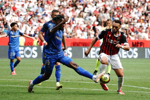 Amine Gouiri (OGC Nice) - Andrew Gravillon (Stade de Reims) FOOTBALL : OGC Nice vs Reims - Ligue 1 Uber Eats - Nice - 08 08 2021 NorbertScanella PanoramiC 