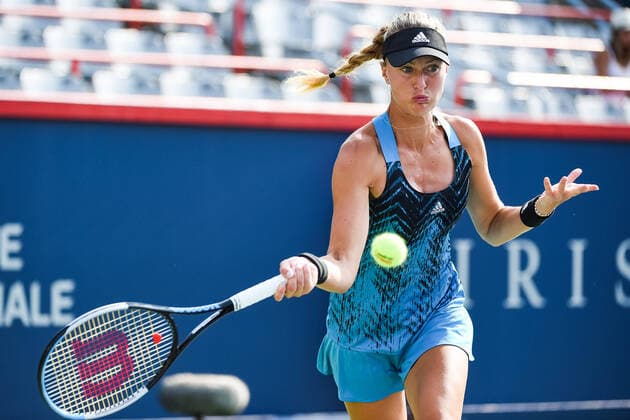 August 08, 2021: Kristina Mladenovic (FRA) returns the ball during the WTA, Tennis Damen National Bank Open qualifying round match at IGA Stadium in Montreal, Quebec. CSM Montreal Canada - ZUMAc04_ 20210808_zaf_c04_042 Copyright: xDavidxKirouacx