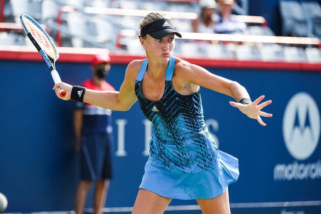 MONTREAL, QC - AUGUST 08: Kristina Mladenovic (FRA) returns the ball during the qualifying WTA, Tennis Damen National Bank Open match on August 8, 2021 at IGA Stadium in Montreal, QC (Photo by David Kirouac Icon Sportswire) TENNIS: AUG 08 National Bank Open Icon210808074