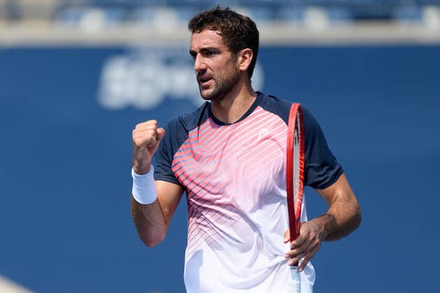 TORONTO, ON - AUGUST 09: Marin Cilic (CRO) celebrates after winning a point during his National Bank Open tennis tournament first round game on August 9, 2021, at Aviva Centre in Toronto, ON, Canada. (Photo by Julian Avram Icon Sportswire) TENNIS: AUG 09 National Bank Open Icon2108090011
