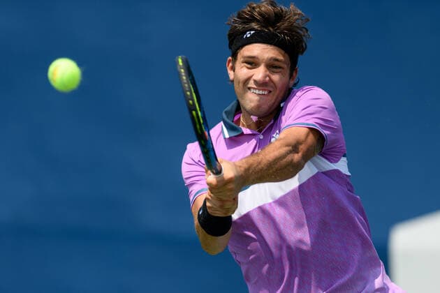 TORONTO, ON - AUGUST 09: Alexis Galarneau (CAN) returns the ball during his National Bank Open tennis tournament first round doubles game on August 9, 2021, at Aviva Centre in Toronto, ON, Canada. (Photo by Julian Avram Icon Sportswire) TENNIS: AUG 09 National Bank Open Icon2108090294